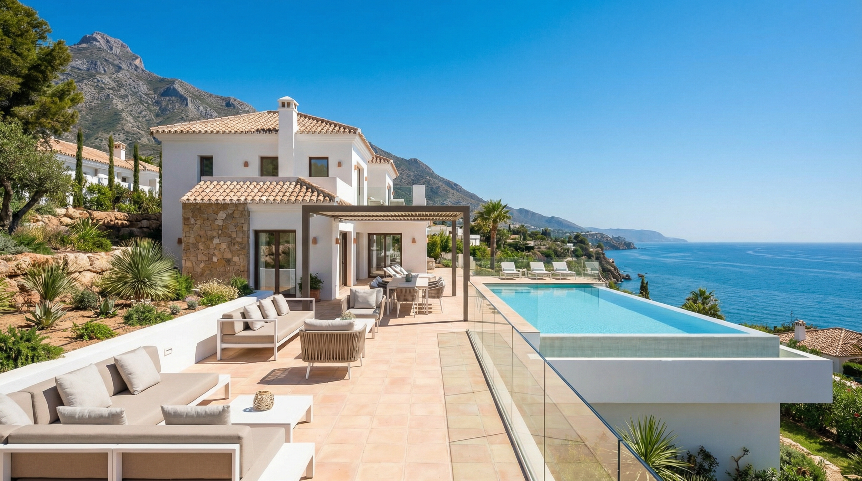 A scenic view of Costa del Sol, Spain, showcasing beautiful beaches and traditional Spanish architecture, ideal for foreign buyers considering mortgages.