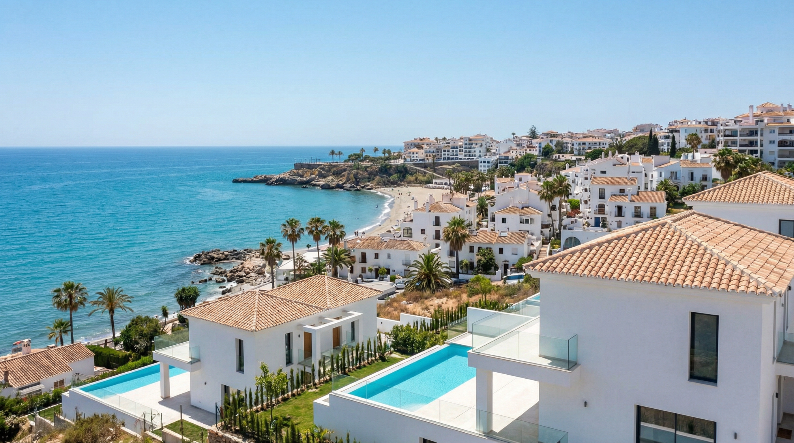 Aerial view of Nerja, Costa del Sol showing Mediterranean coastline, luxury properties, and best areas retirees opportunities